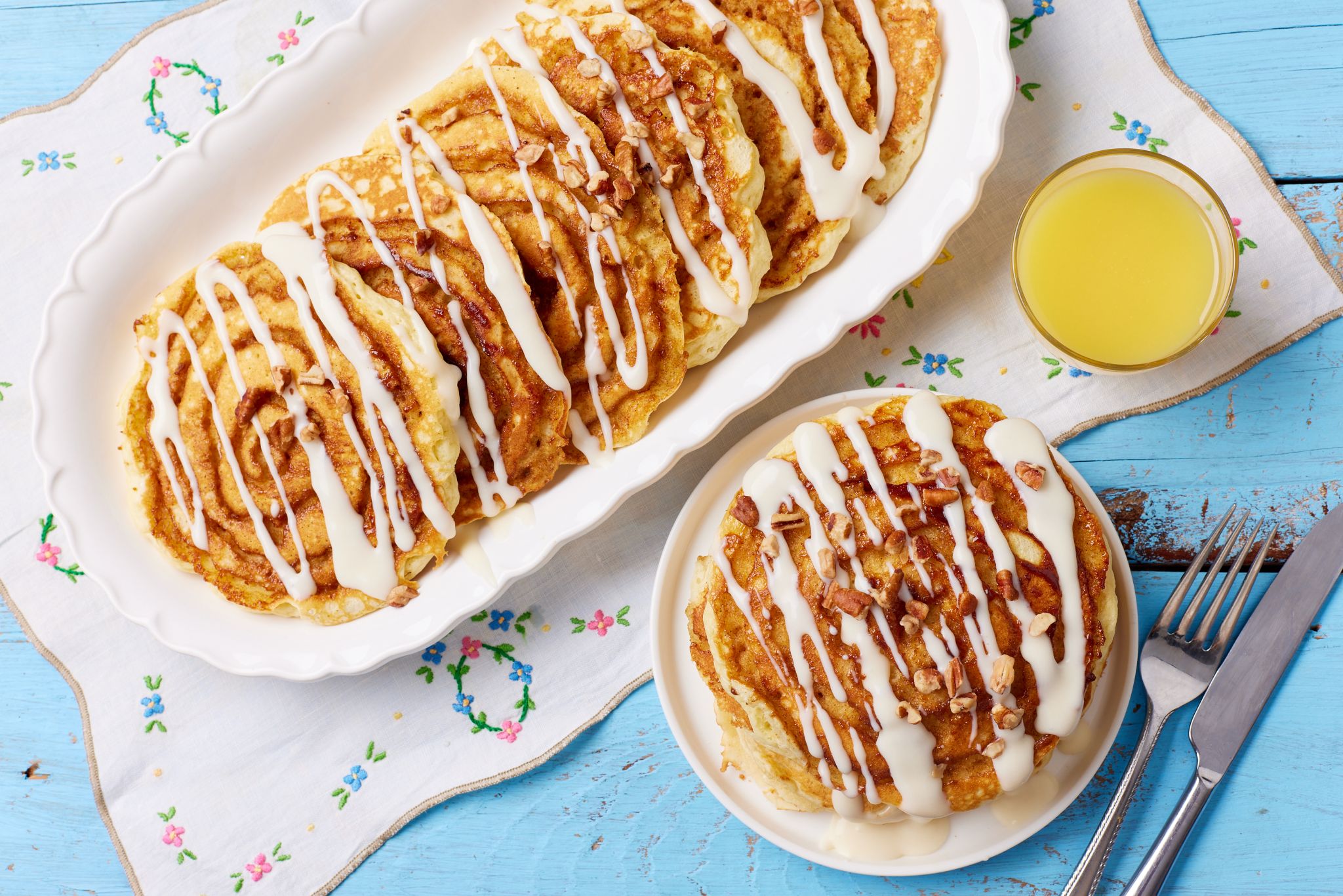 Cinnamon roll pancakes with cream cheese glaze
