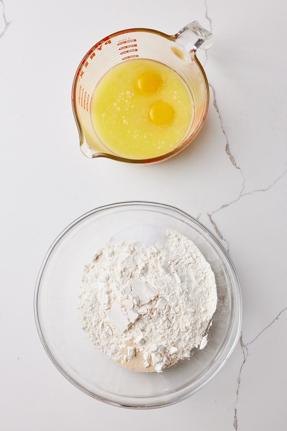 Mix brioche bread recipe dry ingredients in a bowl and wet ingredients in a jug. 