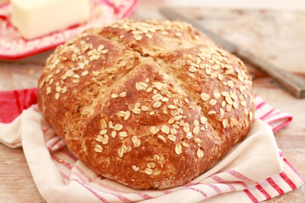 Traditional Irish Soda Bread baked, topped with oats.
