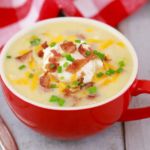 Microwave Loaded Baked Potato Soup In A Mug; Imagine a baked potato with all the trimming: bacon, cheese, sour cream. Now imagine that as a delicious, creamy soup made in the microwave from start to finish in MINUTES! A delicious soup that is guaranteed to warm you cockles and fill you up until dinner.