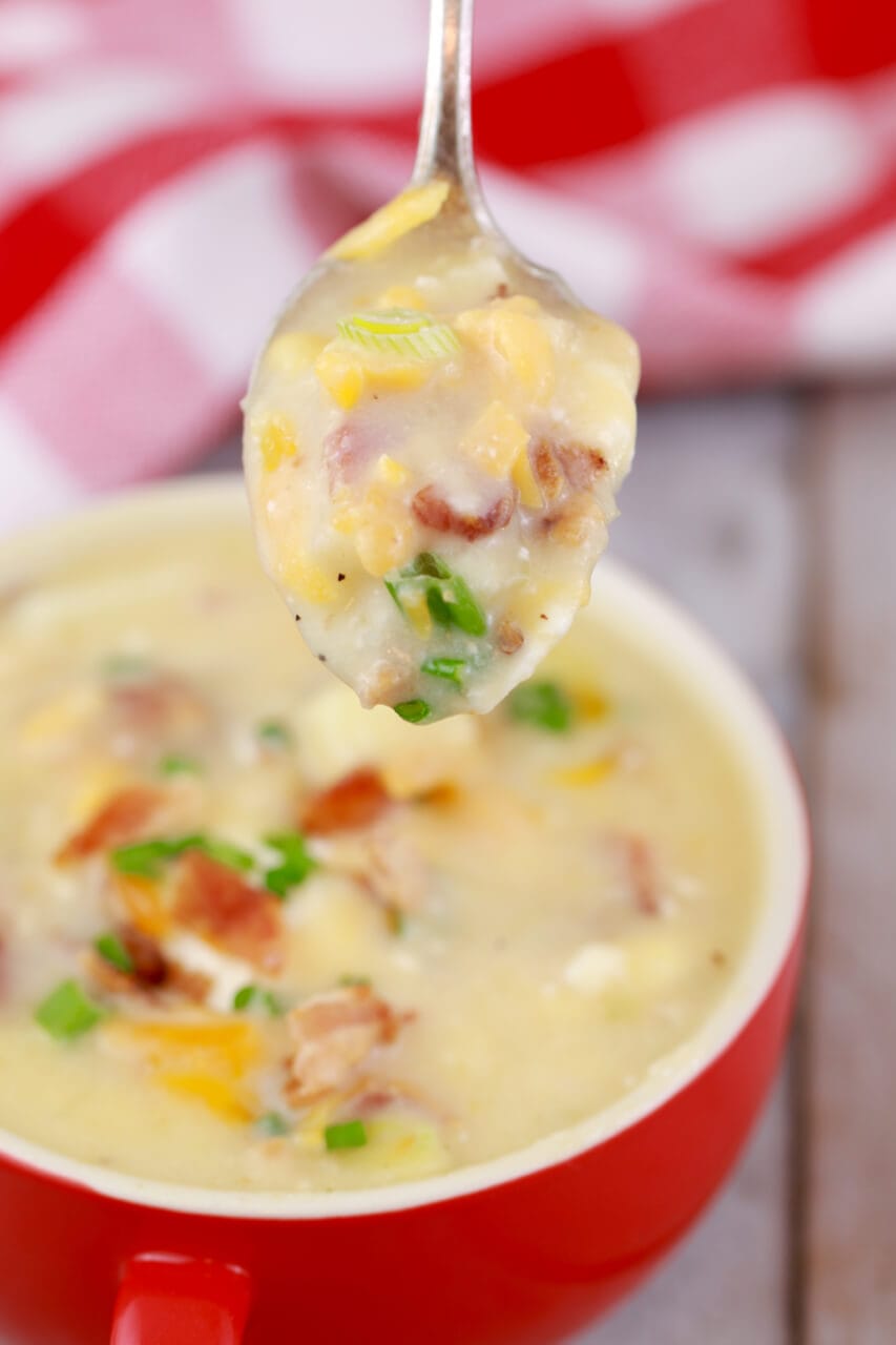 A close-up of my Mug Potato Soup recipe, loaded with bacon, cheese, and more.