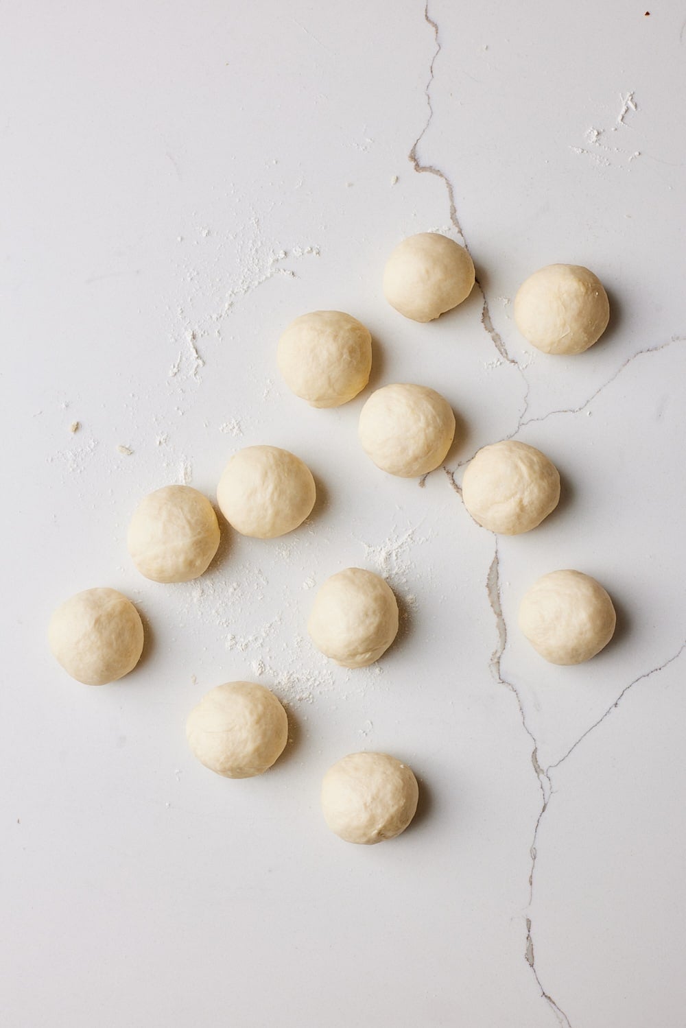 divide the dough into 12 even pieces. 