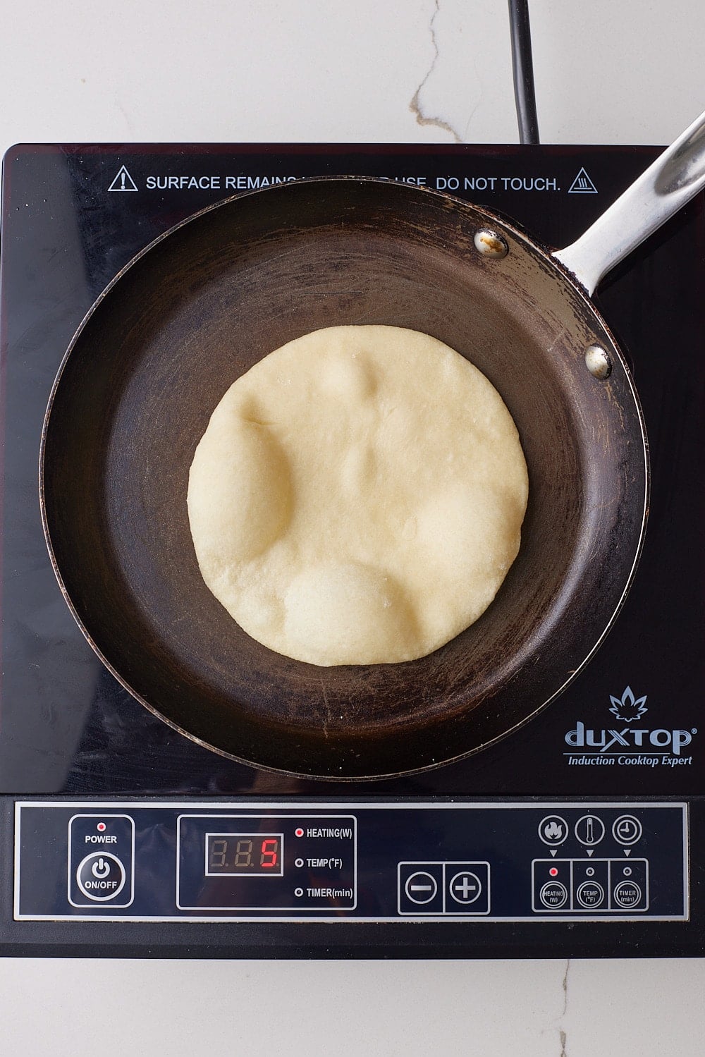 until bubbles appear and the bottom browns