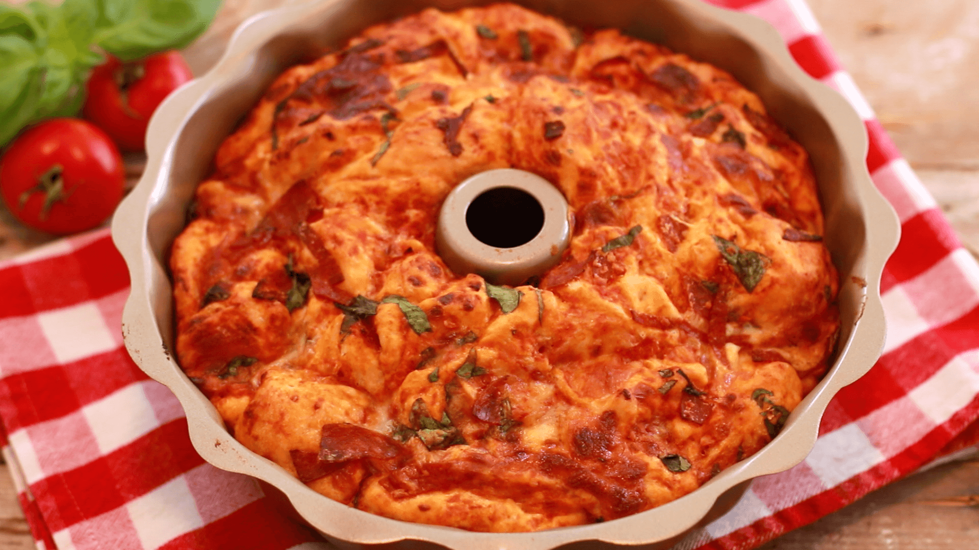 Pizza Monkey Bread - A tear and share loaf of deliciousness held together with gooey mozzarella, pizza sauce and pepperoni. What could be better?