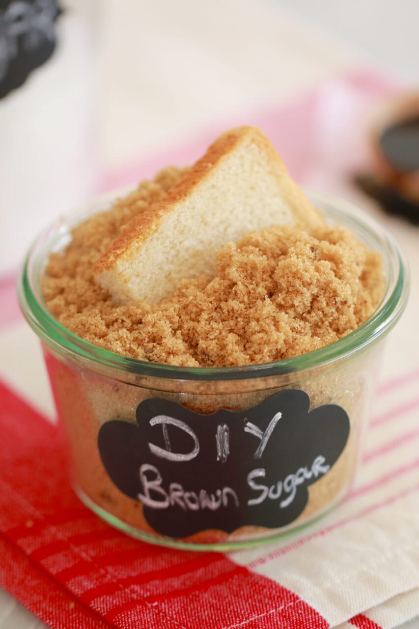 Easy Brown Sugar recipe in a jar with a slice of bread.