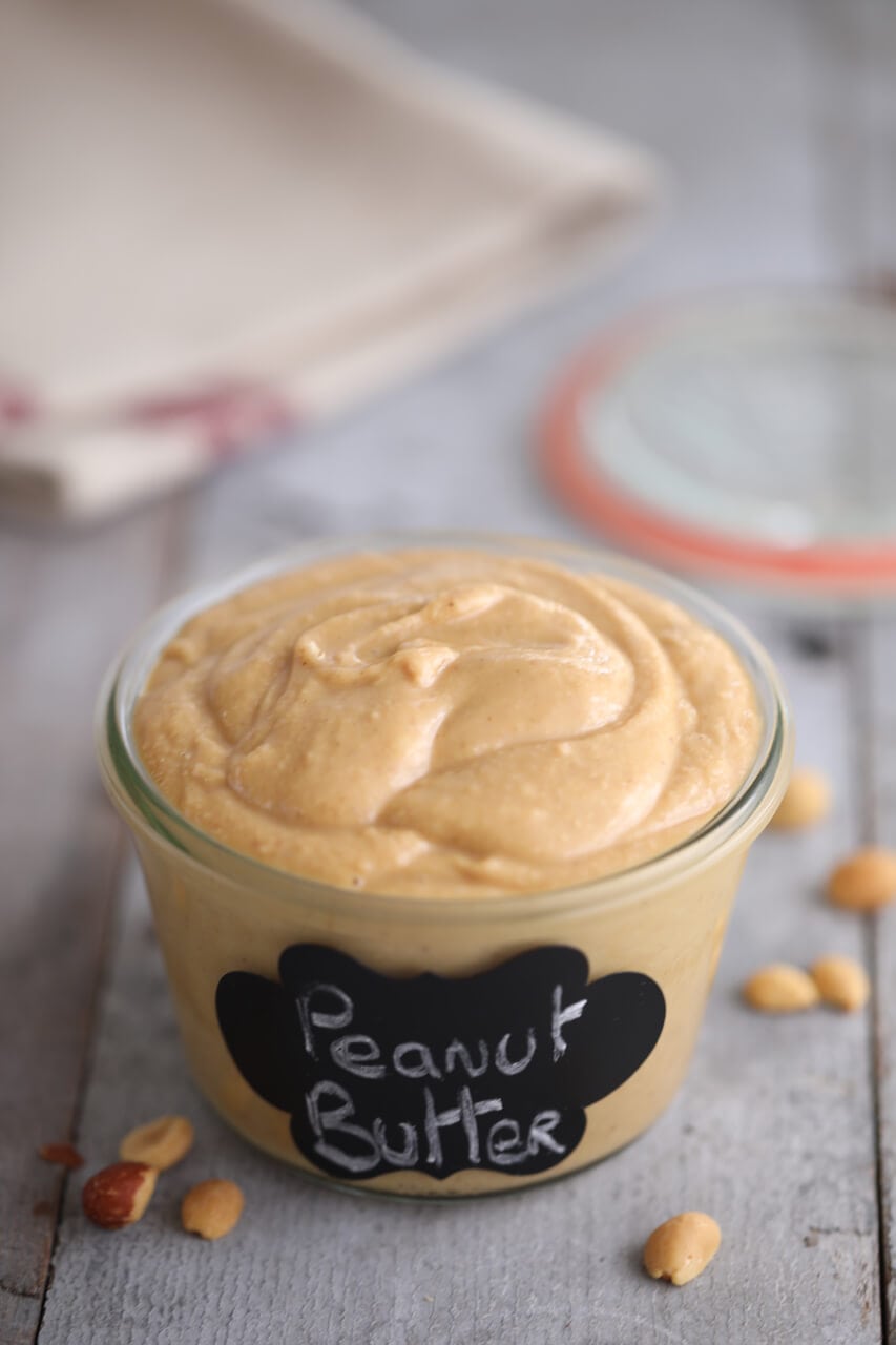 A jar of peanut butter, made at home, marked peanut butter.