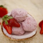 Strawberry and Mint Coconut Ice Cream - This Dairy Free 2 ingredient is out of this world, and you don't even need an ice cream machine to make it.