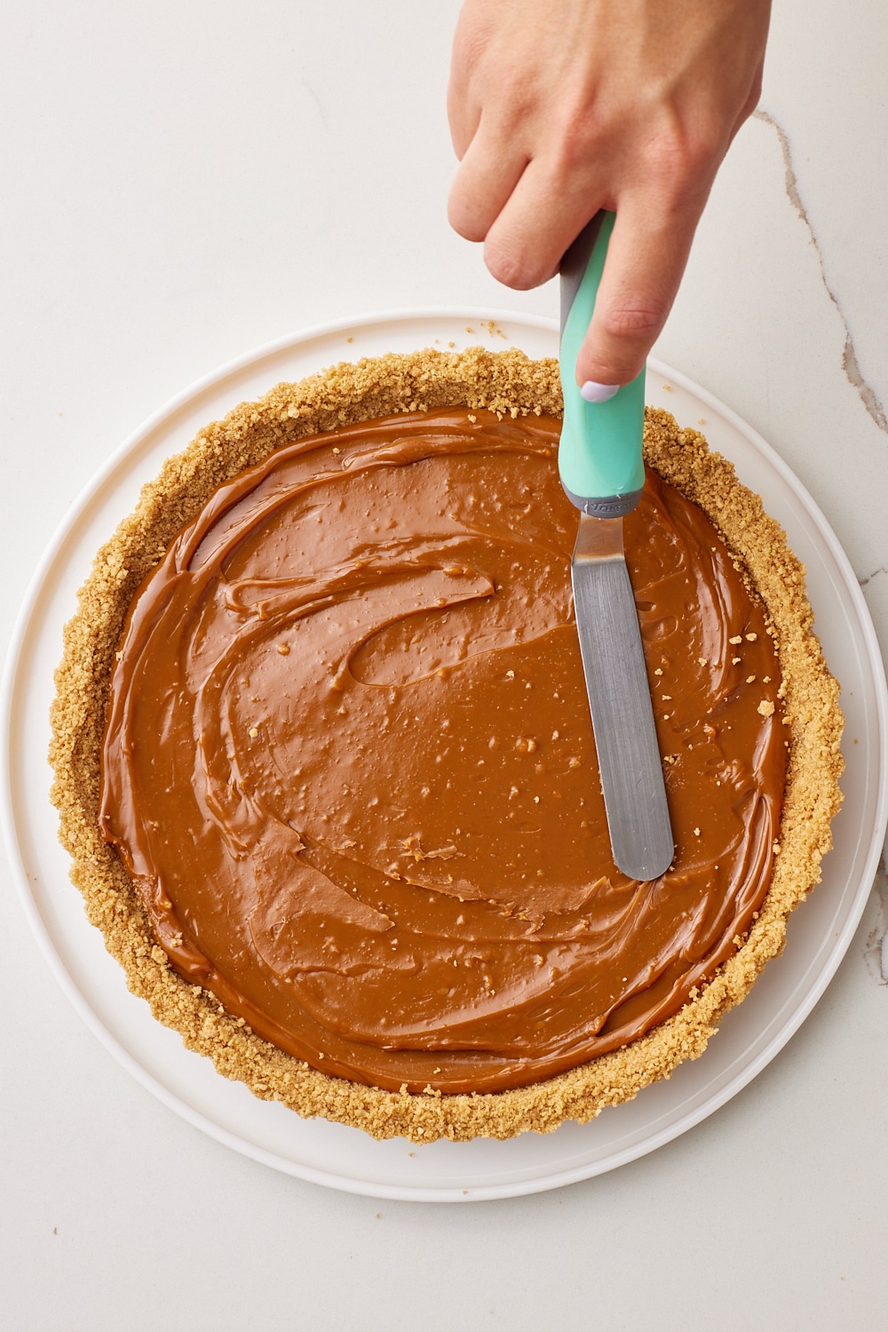 Banoffee Pie3 Spread dulce de leche over.