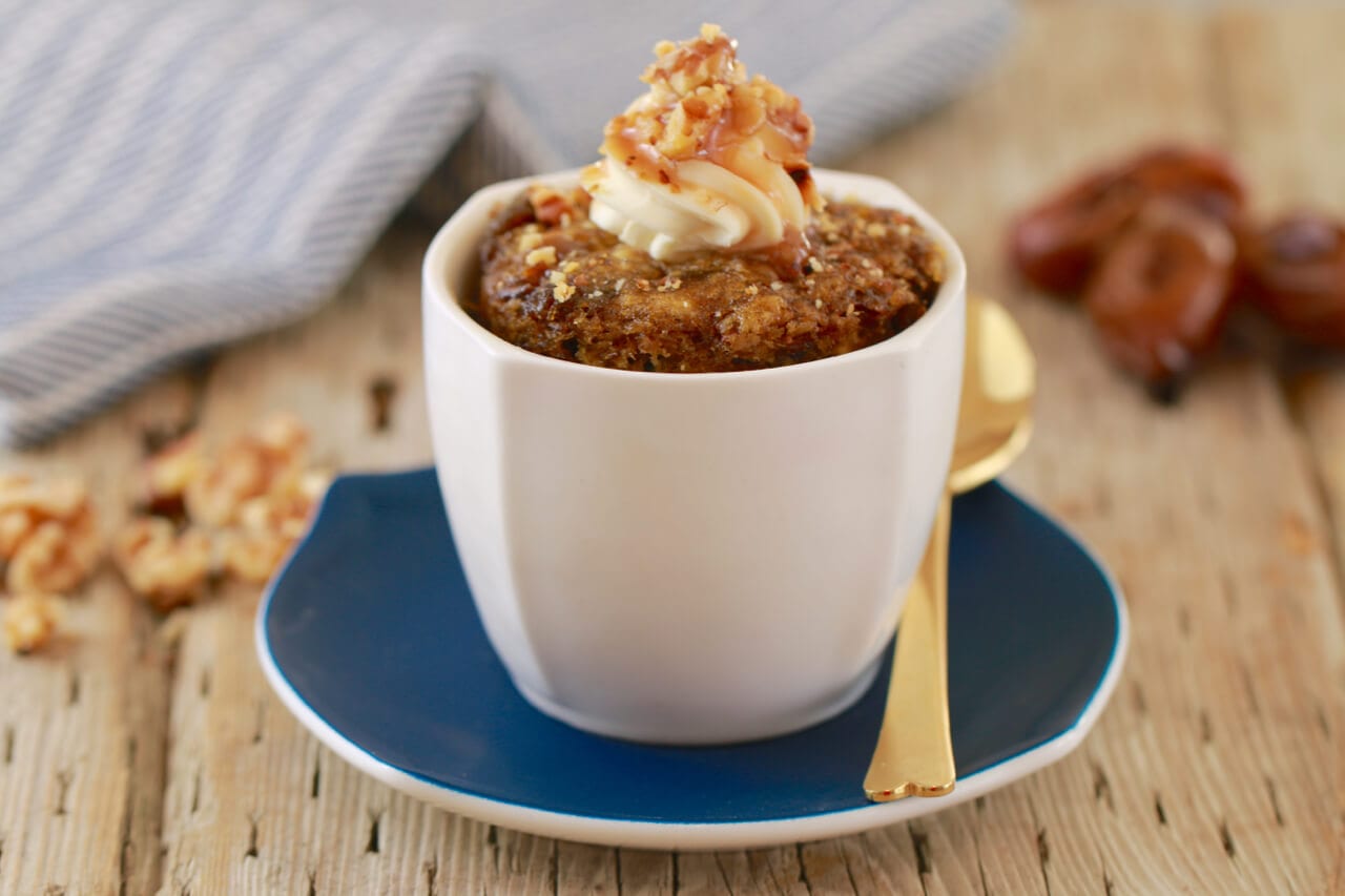 1 Minute Sticky Date Pudding In a Mug- Moist and decadent, this mug cake will blow your socks off AND it’s make in minutes in the microwave