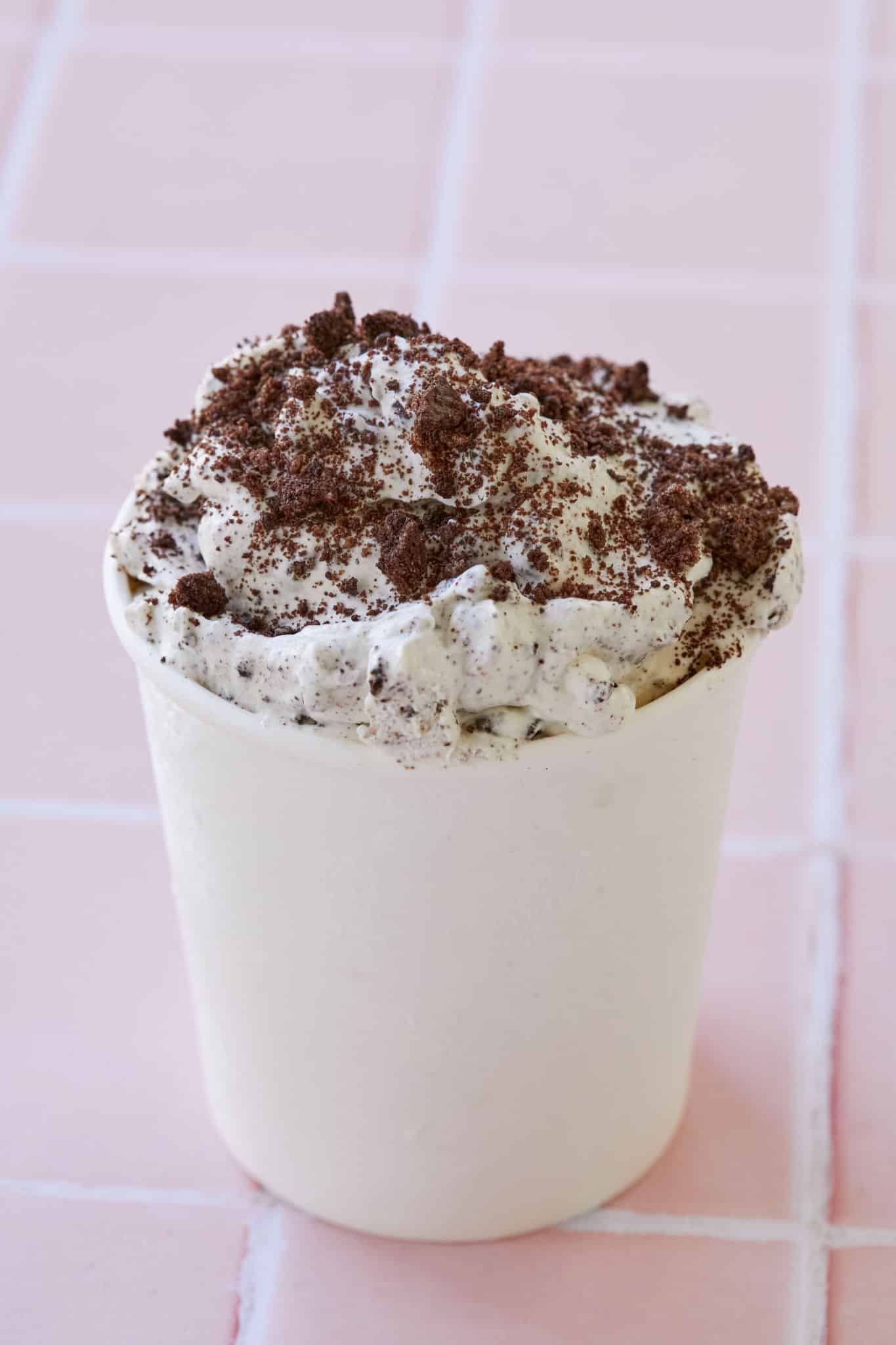 A tub of cookies and cream ice cream