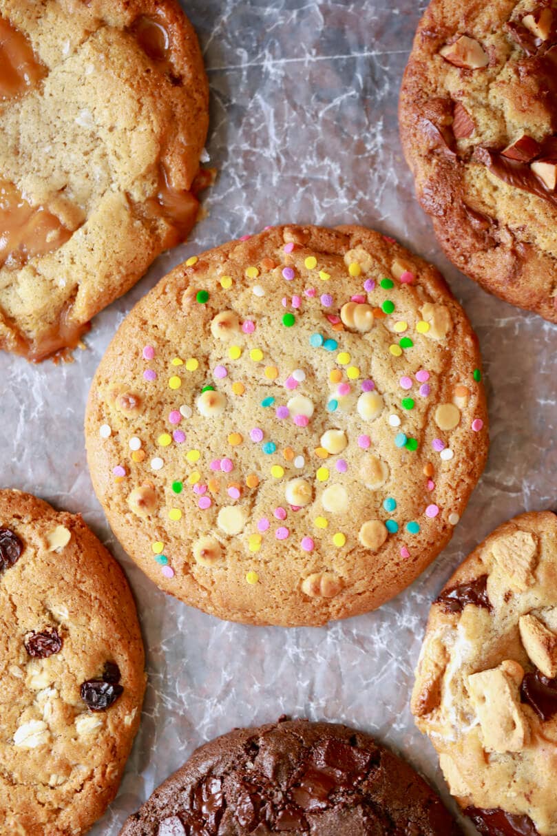 A beautiful birthday cake cookie surrounded by all the other cookies you can make with my Crazy Cookie Dough.