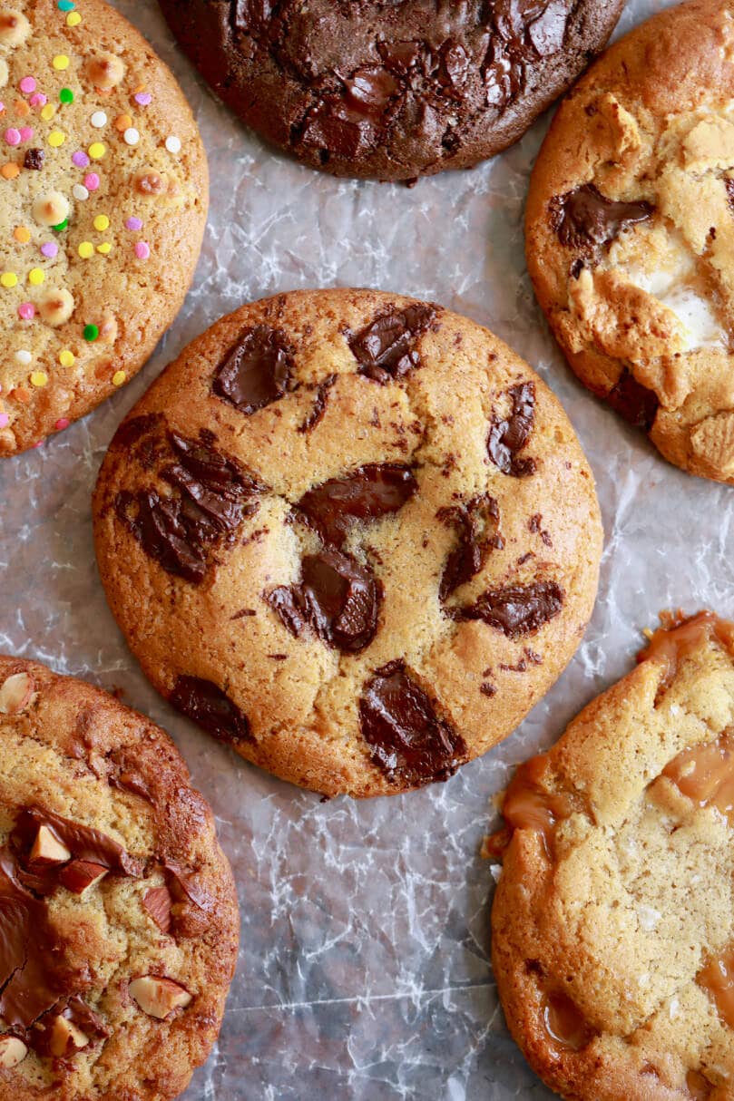 A chocolate chip cookie surrounded by other flavors.