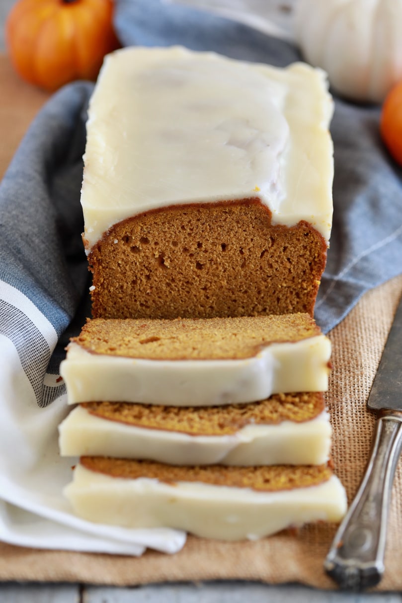 My easy pumpkin bread is the best-ever, and this picture shows a loaf sliced and ready to serve.