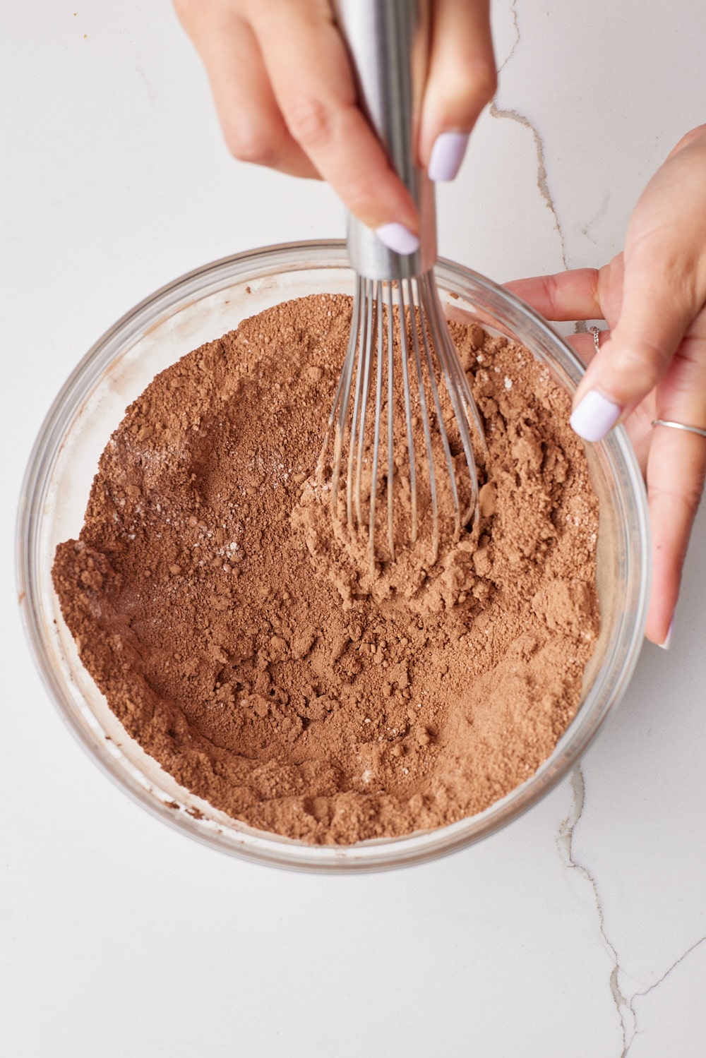 Healthy Chocolate Banana Bread dry ingredients mixed in a glass bowl. 