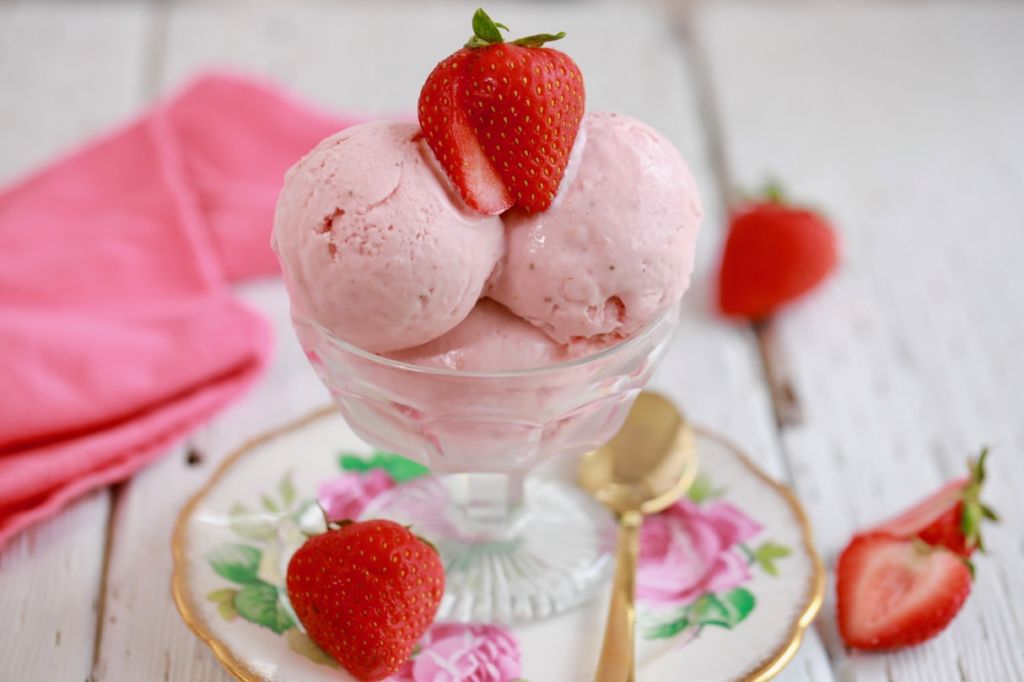 Homemade Strawberry Ice Cream Recipe - Easy Strawberry Ice Cream recipe with just a few ingredients and no churning needed!