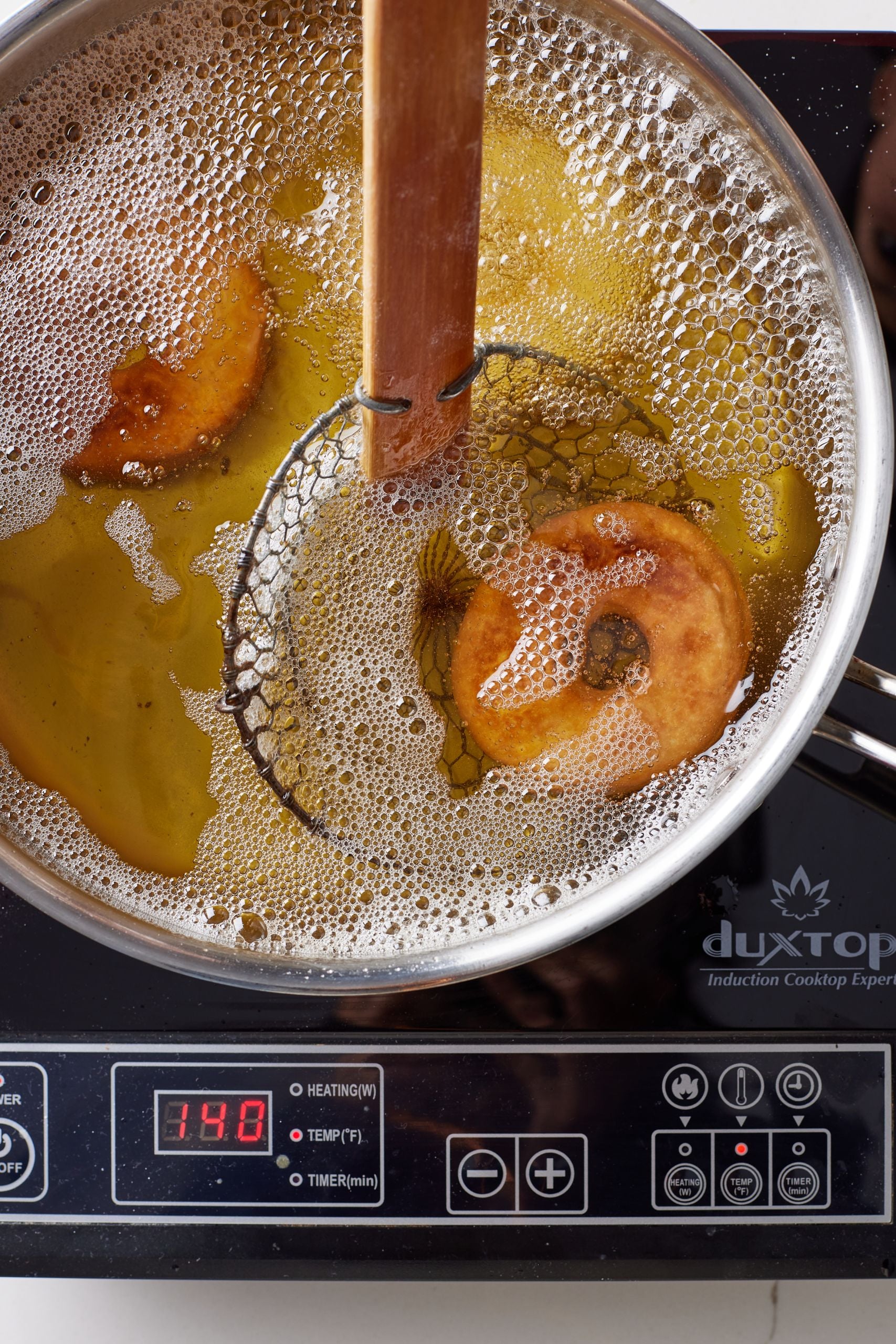 Fry donuts until golden brown. 