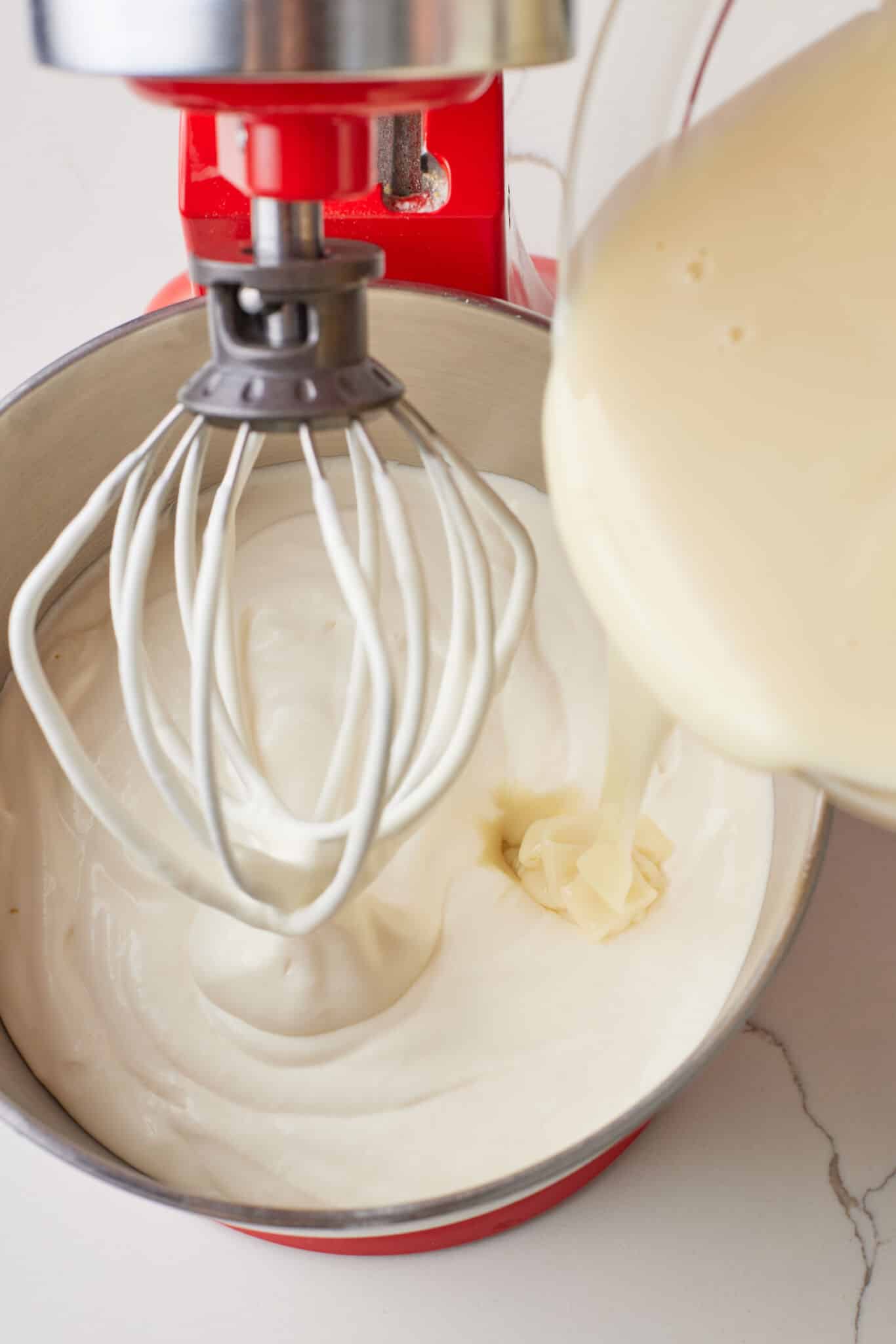 No Machine Chocolate Ice Cream2 Pour in the sweetened condensed milk to softly whipped cream.
