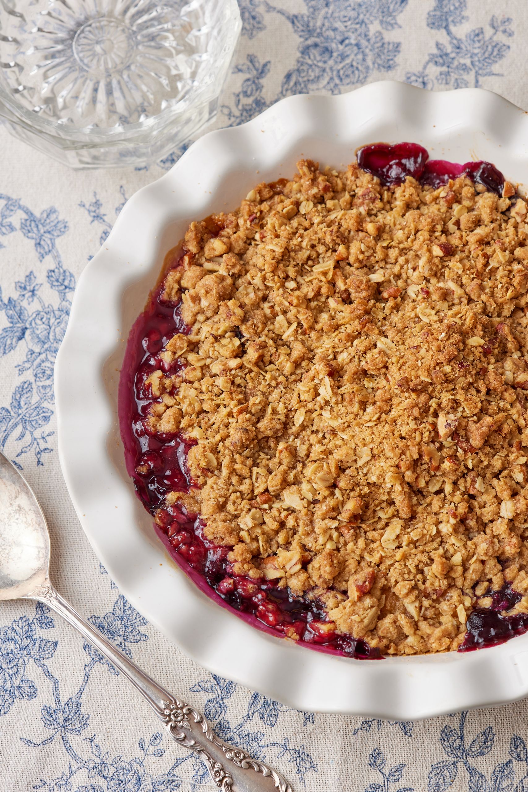 A top dow view of crisp with golden topping and bubbly fruit