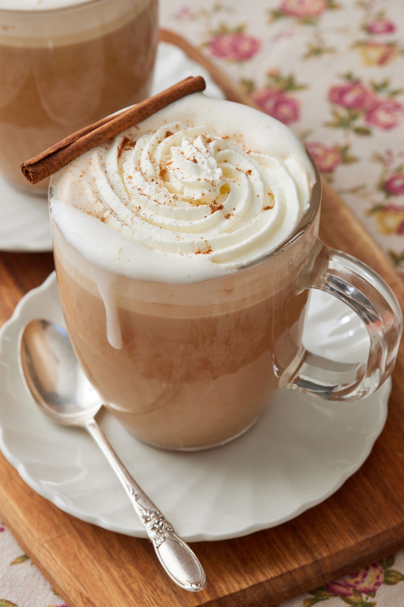 Pumpkin spice latte with whipped cream and cinnamon.