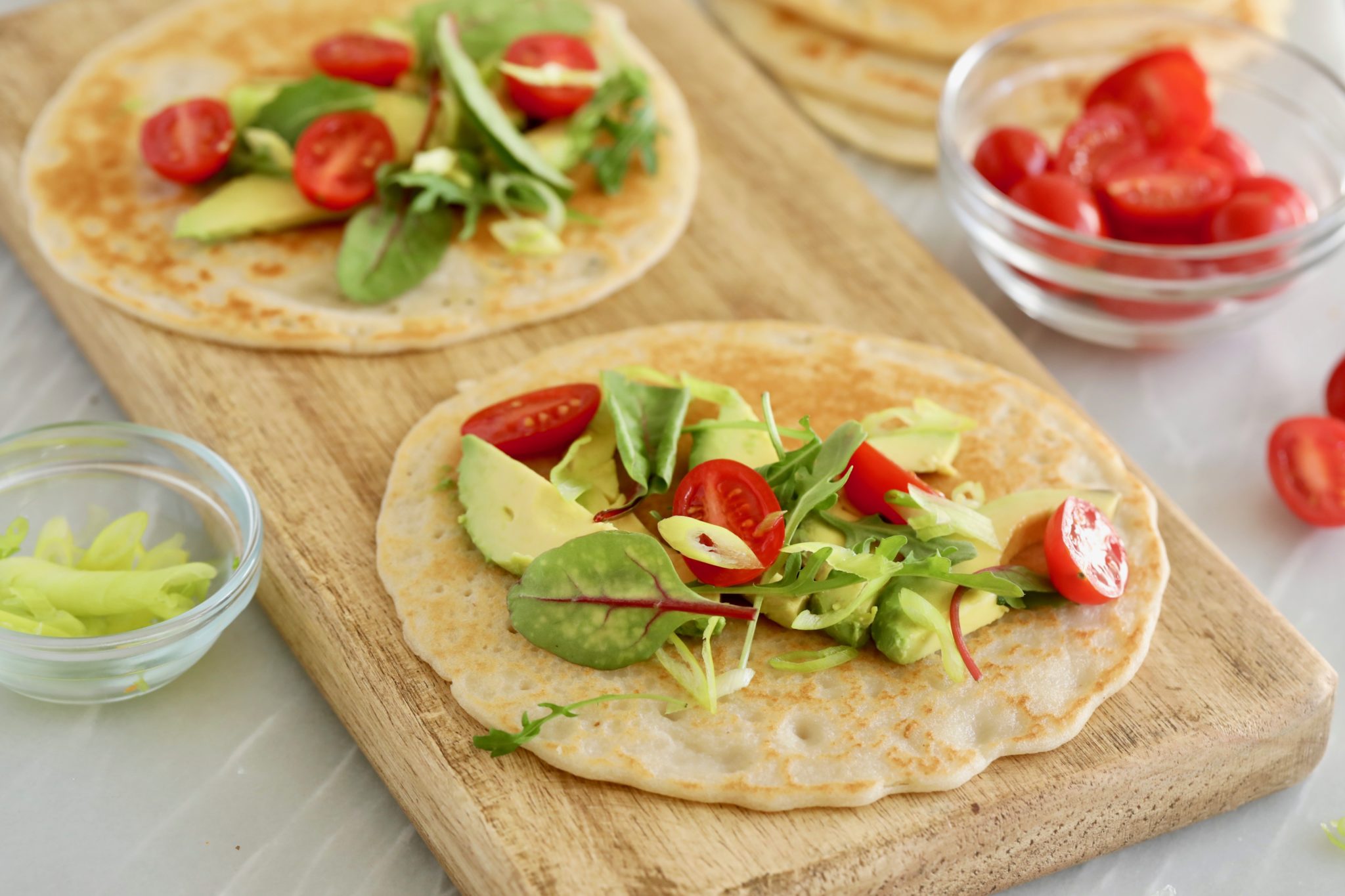 Flatbreads on a serving board.
