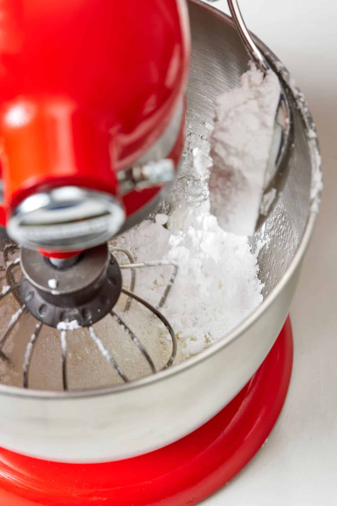 Add powdered sugar gradually until all is incorporated. 