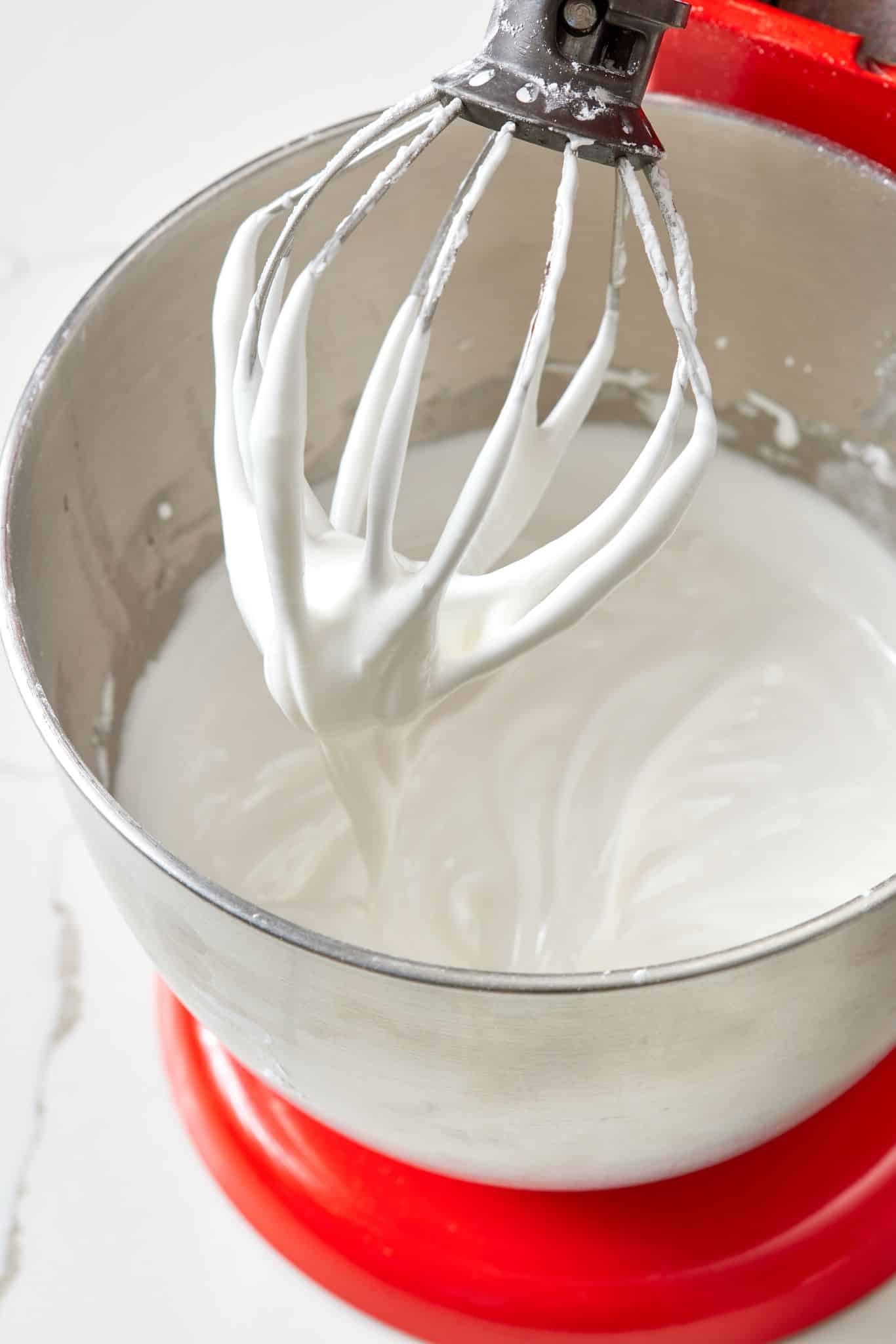 Add lemon juice and whip until thickened. 