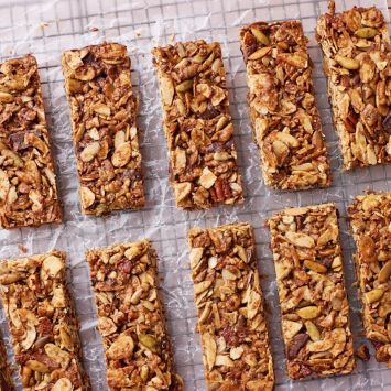 Evenly Bake for Structure: Make sure the bars are golden brown across the entire tray, not just the edges. This ensures all ingredients bind together and the bars hold their shape. Press Firmly: Use the back of your spatula to compact the mixture firmly in the tray before baking. This prevents crumbling and gives clean, uniform bars. Cool Completely: Allow the bars to cool fully in the tray before slicing. Cutting too early can make them fall apart. Customize Your Mix: Swap nuts, seeds, or add dried fruits to suit your taste. The recipe is highly adaptable, so get creative with flavors. Sweetener Choices: If using allulose instead of coconut sugar, note that it browns differently. Keep an eye on baking time to prevent over-browning. Chocolate Tips: Fold in chocolate after mixing wet and dry ingredients. This prevents it from melting too much and keeps chunks intact in the bars. Nut & Seed Swaps: Feel free to substitute nuts and seeds with alternatives like cashews, pistachios, or hemp seeds depending on availability or preference. Adding Dried Fruit: Dried fruits like cranberries, raisins, or chopped dates work well, but slightly reduce the syrup to prevent stickiness. Vegan Tip: Use maple syrup instead of honey and dairy-free chocolate to make the bars fully vegan. Using Allulose: Allulose works well as a sugar substitute, but remember it browns differently than sugar, so monitor baking closely.
