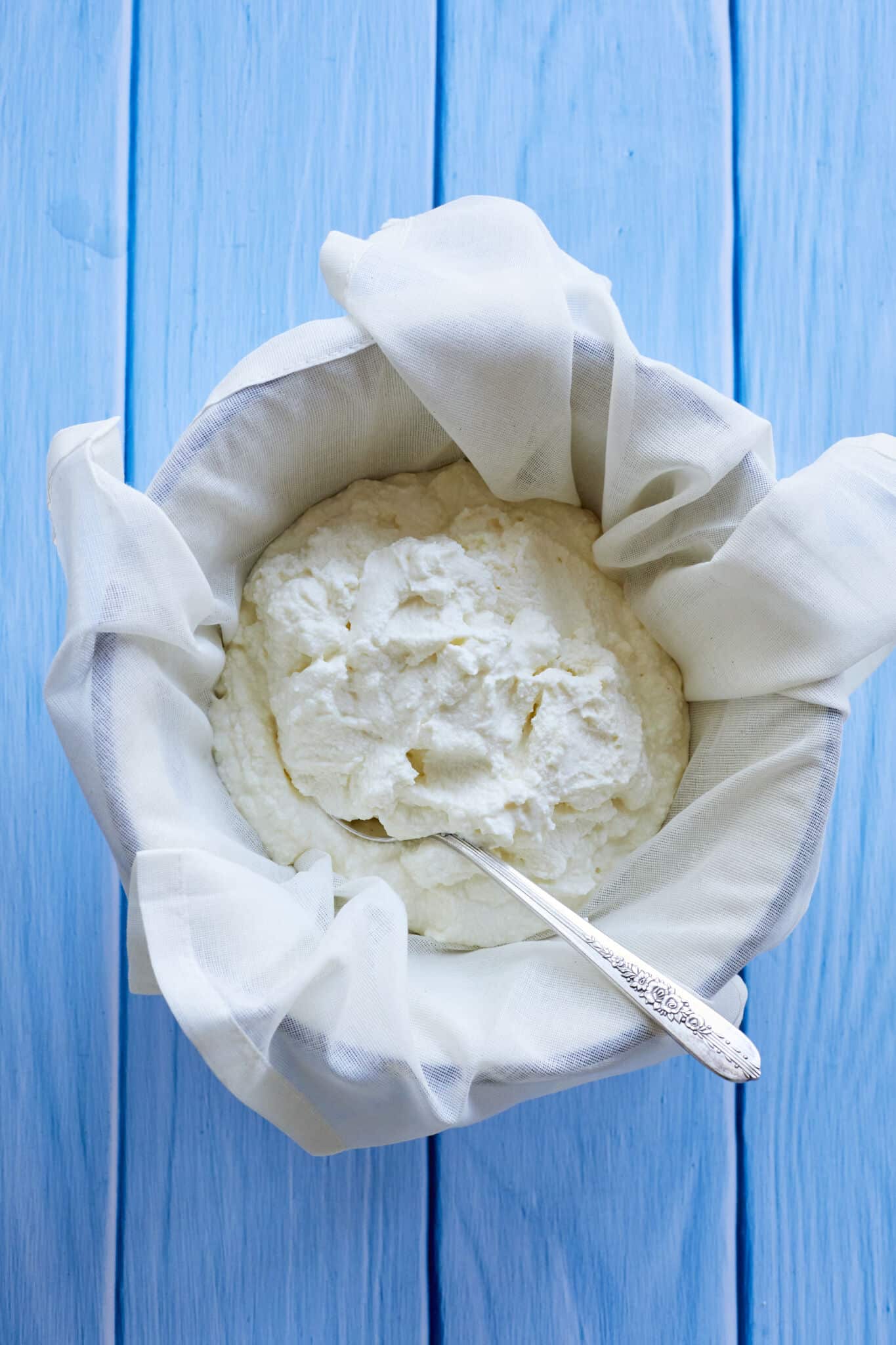 Ricotta cheese in a cheesecloth 