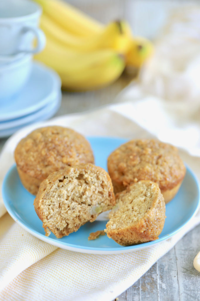 A cross section of healthy banana muffins showing texture and consistency