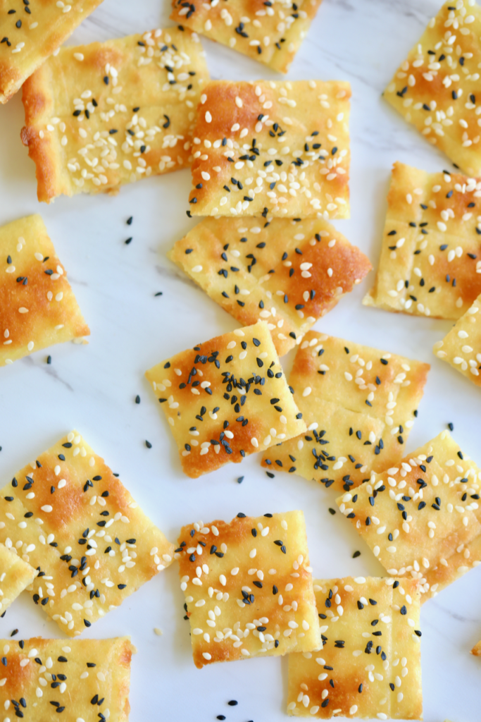 A close up of the Keto Crackers, baked, and topped with sesame seeds, showing texture and color.