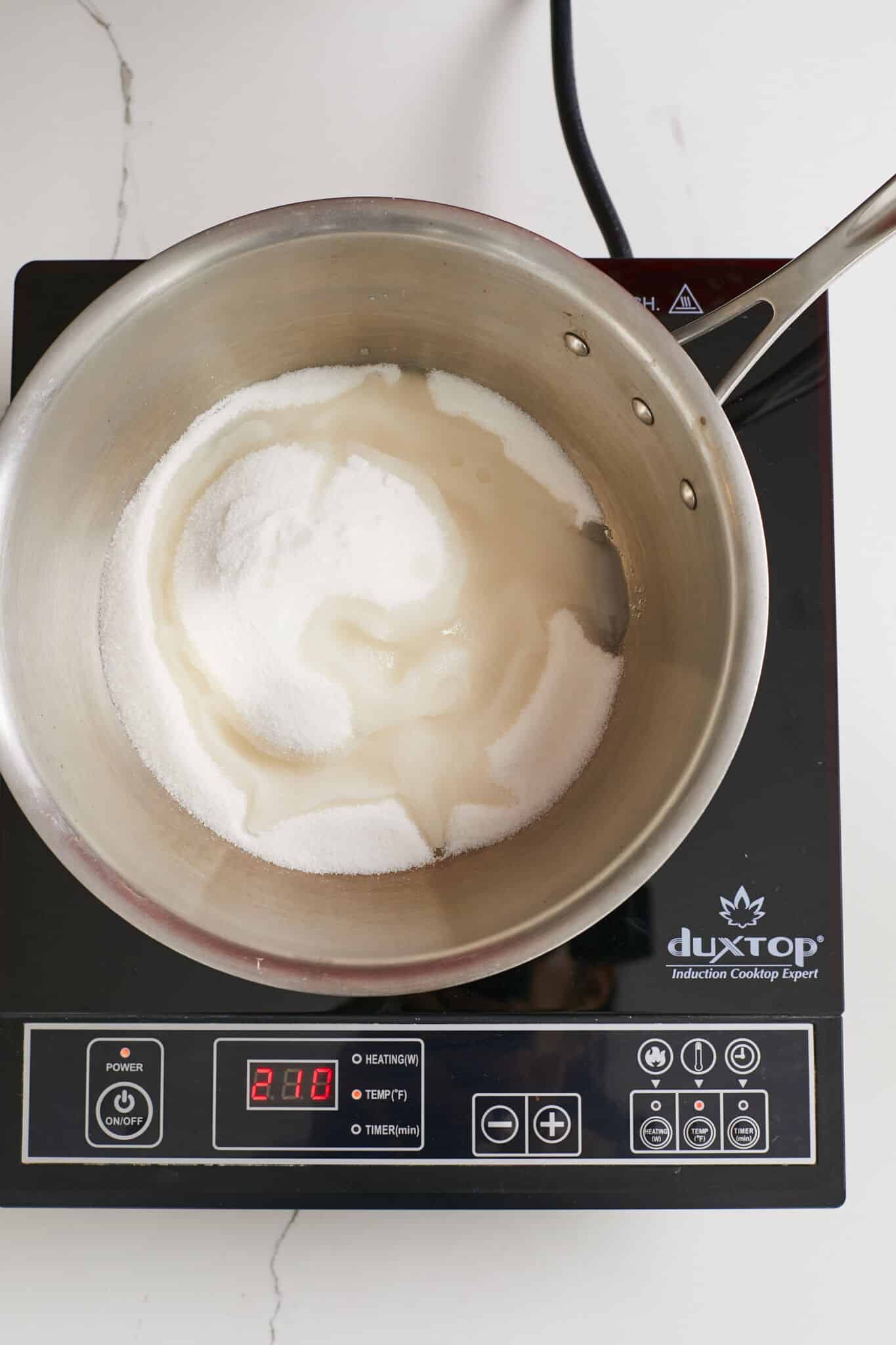 Golden Syrup2 Dissolving sugar in a heavy bottom saucepan.