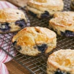 Fresh Blueberry Scones Recipe hot out of the oven on a cooling rack by Gemma Stafford, Bigger Bolder Baking