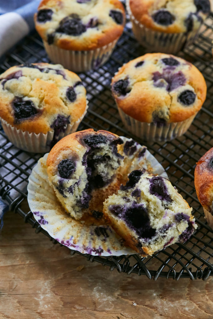 The interior of one of my Bakery-Style Lemon Blueberry Muffins, showing texture and the amount of blueberries inside.