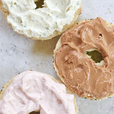 3 Flavors of Cream Cheese spread on bagels