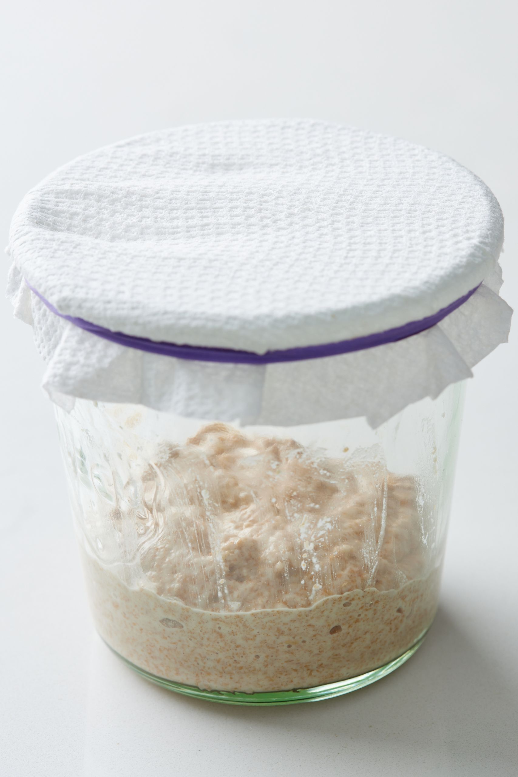maintaining the starter: Cover loosely with a small cloth or kitchen paper, and let it rest in at room temperature in a warm spot, for 24 hours.