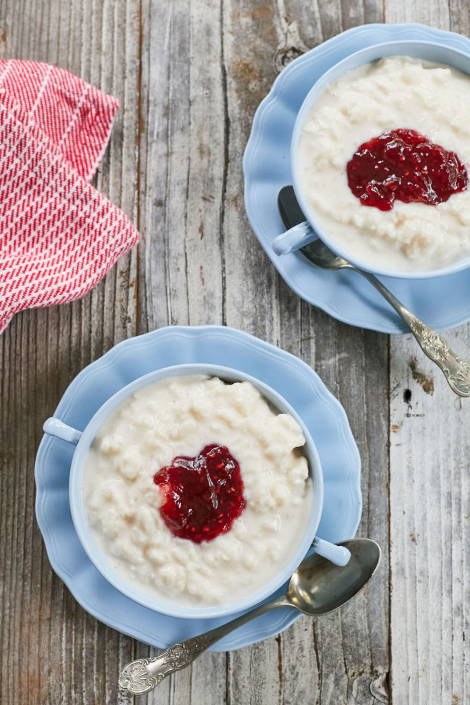 A top-down view of the Creamiest Rice Pudding, topped with jam.