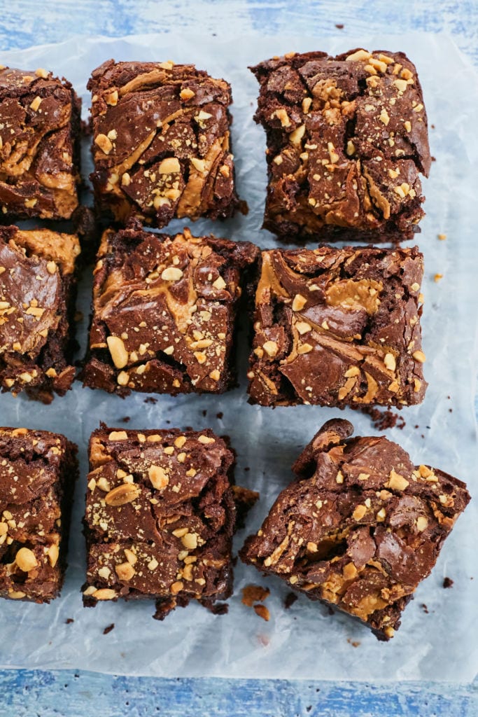 Ultimate Peanut Butter Brownie recipe bake and arranged in a grid of squares.