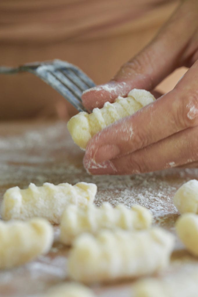 A close up of Homemade Gnocchi, showing their iconic ridges.