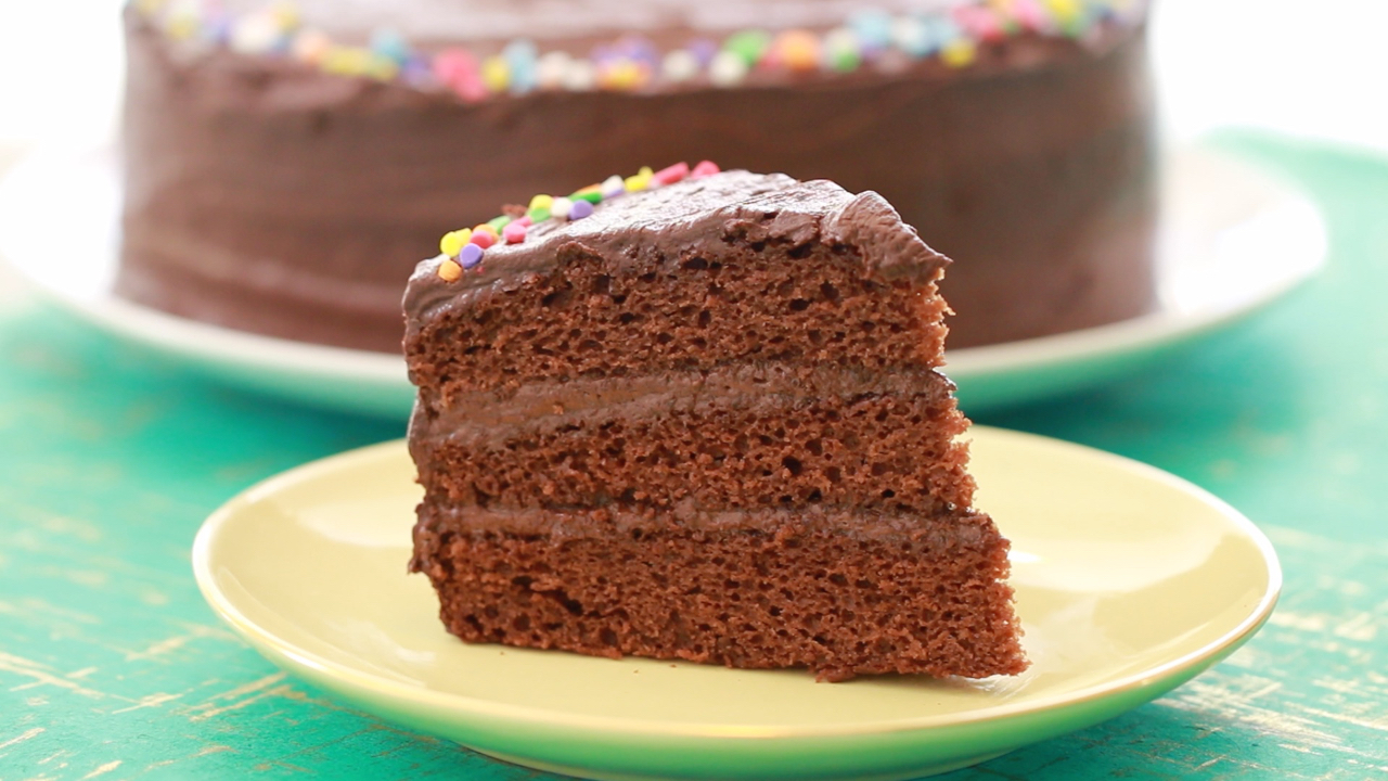 A slice of my Classic Chocolate Cake recipe, showing the inside layers and texture.