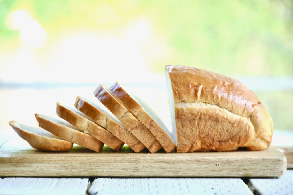 A side-view of a loaf my my Perfect Homemade White Bread, perfect for sandwiches.