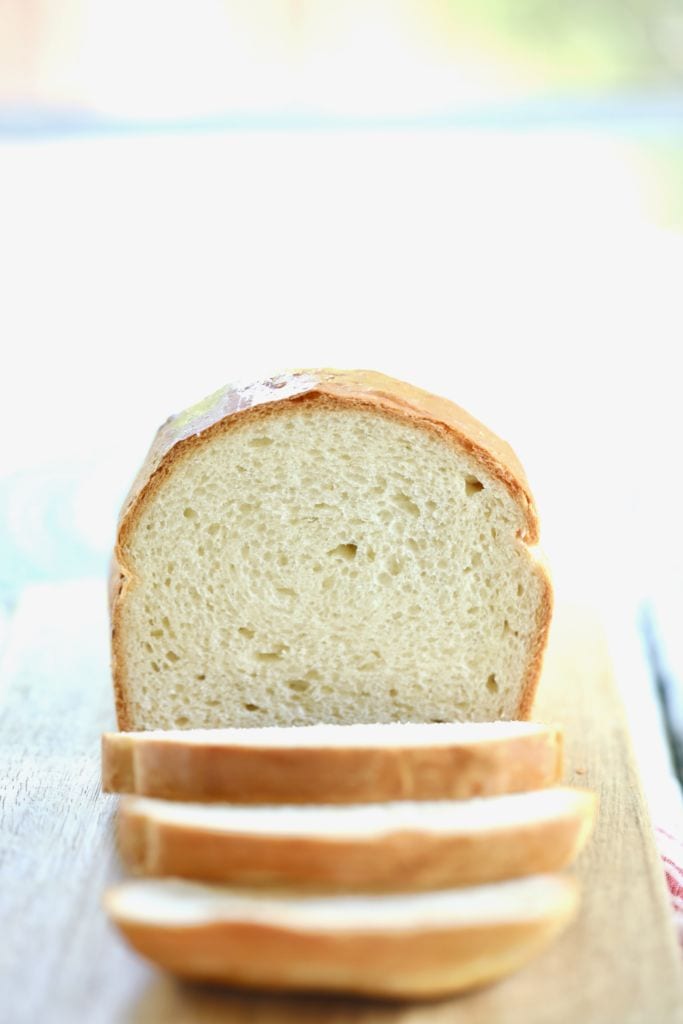A loaf from my Homemade White Bread recipe, sliced, showing the shape and crumb.