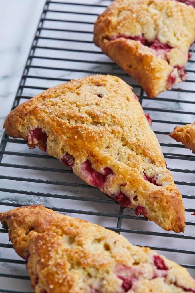 A Simple Raspberry Scone recipe triangle, baked to perfection.
