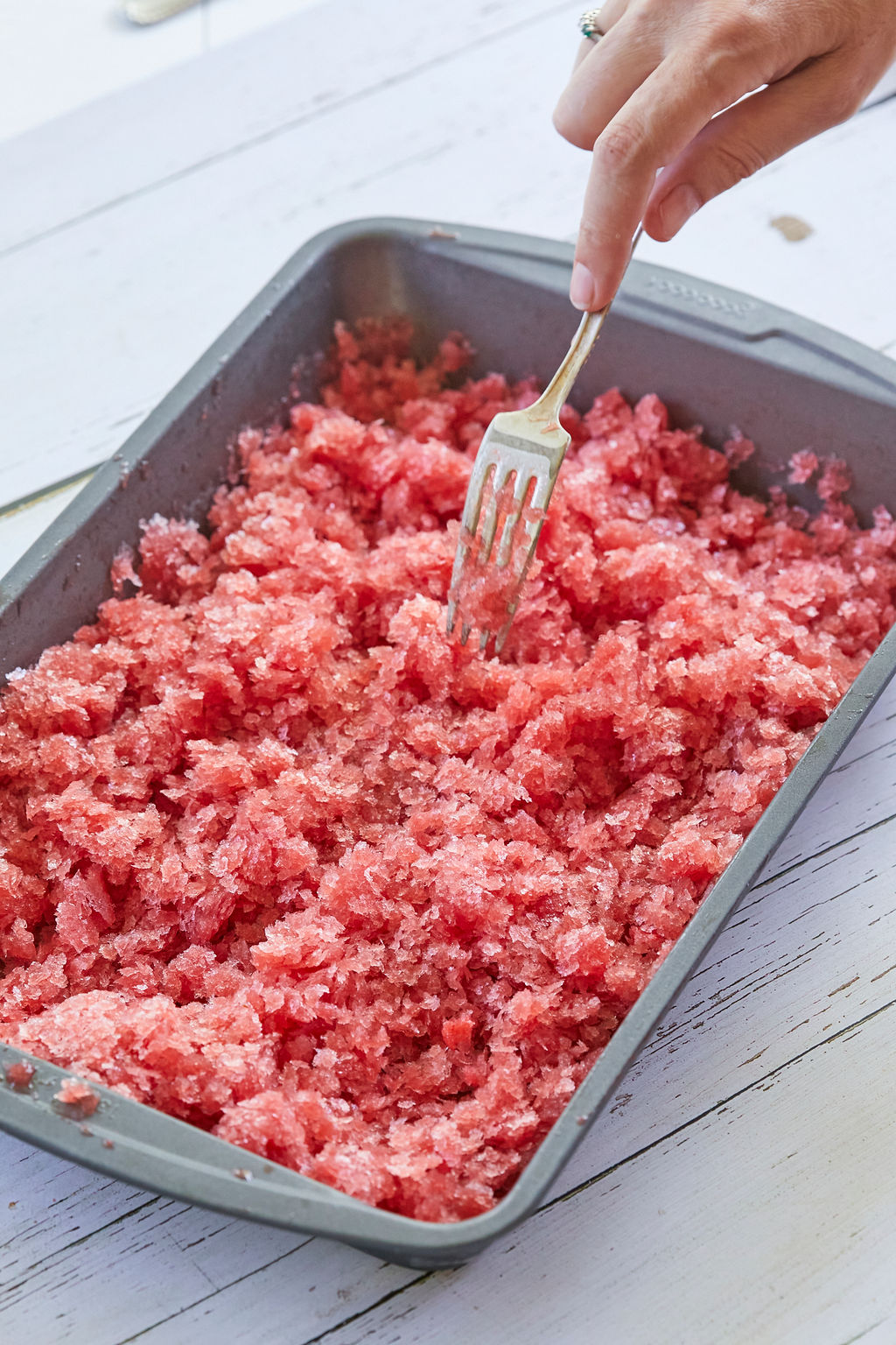 Making my Blood Orange Granita recipe in a baking pan and using a fork to scrape the ice into the right crunchy texture.