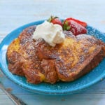 A plate of finished Brioche French Toast, ready to eat.