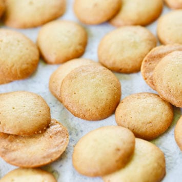 A pile of homemade vanilla wafers, crisp and buttery.