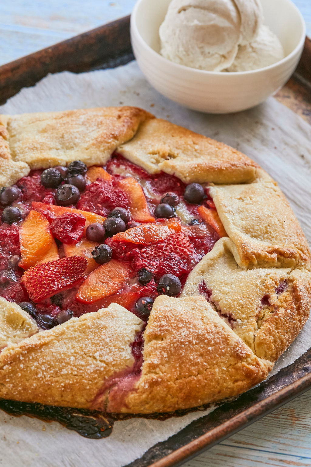Rustic Summer Fruit Galette baked and filled with berries and frangipane.
