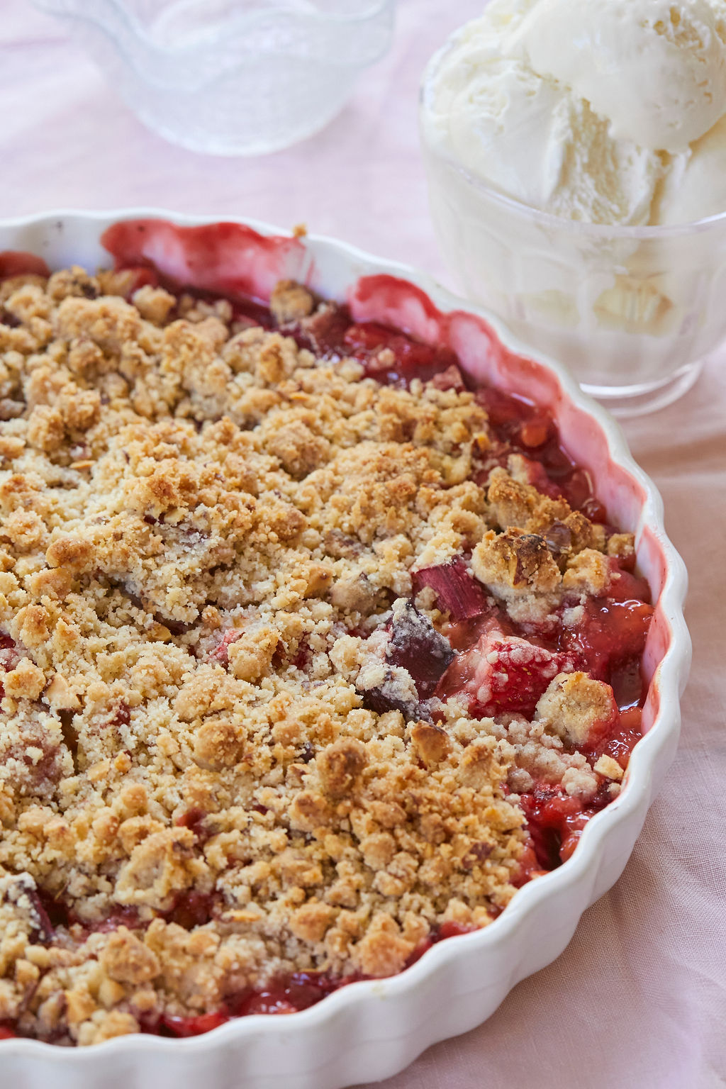 A close up of Strawberry Rhubarb Crisp, to show texture and color when finished.