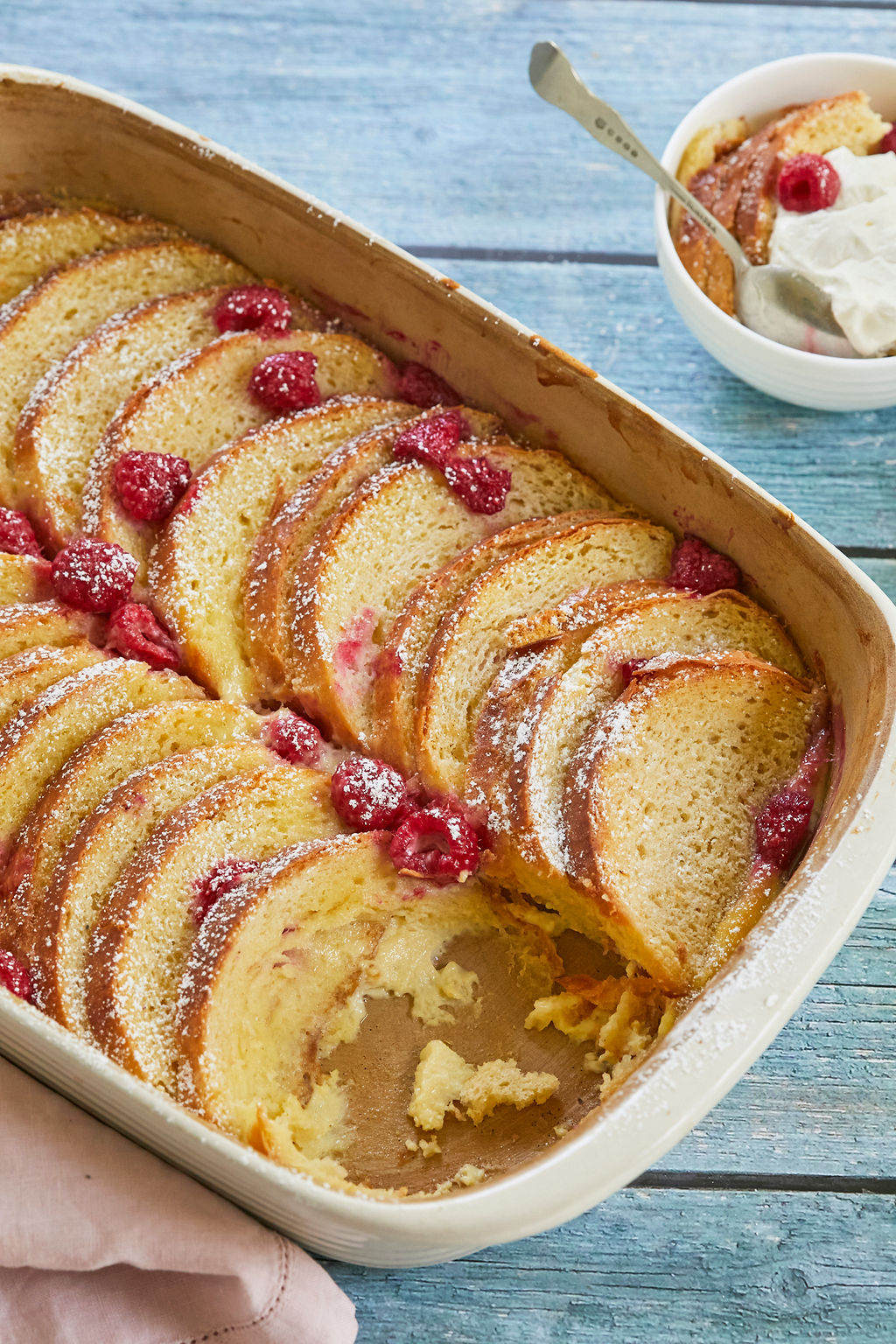 A serving of White Chocolate, Whiskey, and Raspberry Bread Pudding.