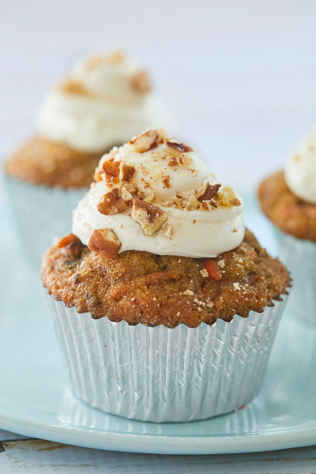 My moist carrot cake cupcake recipe in a silver lining and best-ever cream cheese frosting.