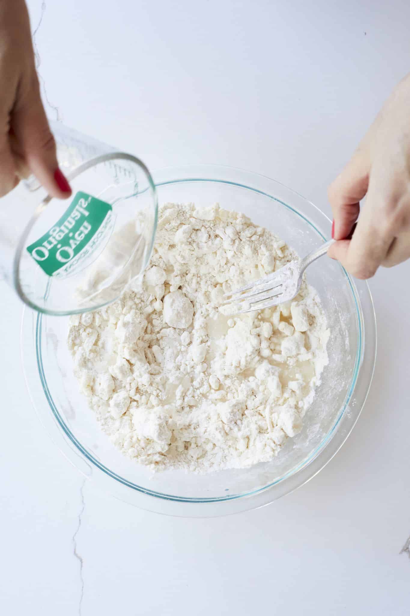 Easy Homemade Pie Crust Recipe3 Combine wet ingredients then add to the dry and butter mixture.